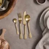 Nkuku Tableware Veeta Cutlery Set - Brushed Gold (Set Of 16) 1 Nkuku Tableware Veeta Cutlery Set - Brushed Gold (Set Of 16)